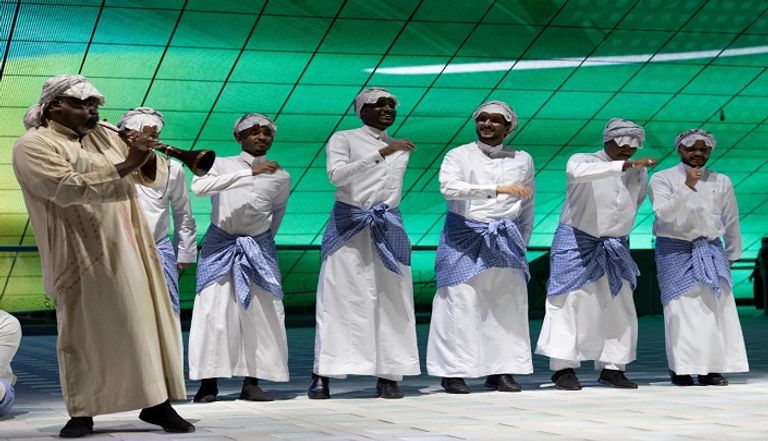 عرض فني في جناح المملكة العربية السعودية