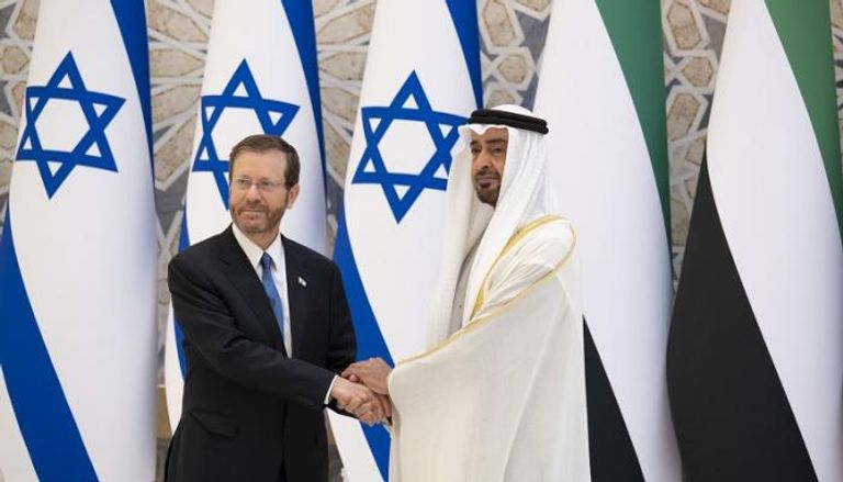 الشيخ محمد بن زايد آل نهيان والرئيس الإسرائيلي إسحاق هرتسوج