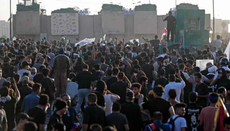 متظاهرون في احياء ذكرى احتجاجات تشرين