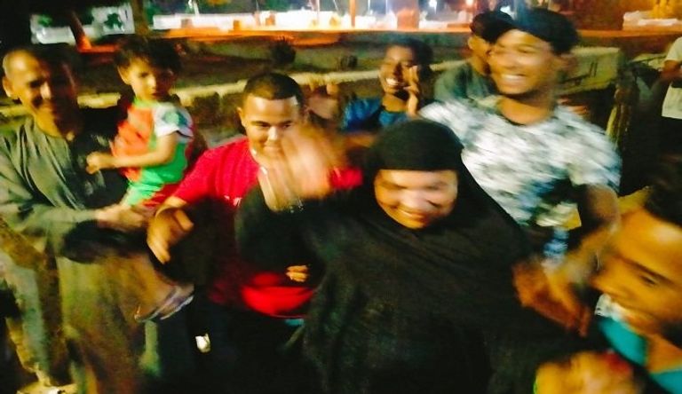 السيدة رضا مع أبنائها