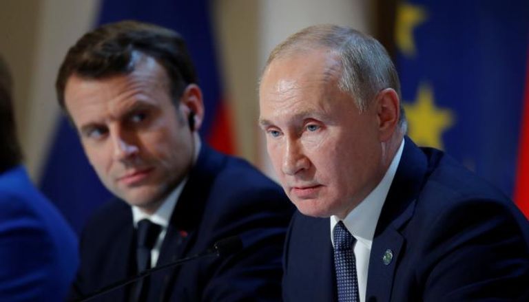 لقاء سابق يجمع الرئيسين الروسي بوتين والفرنسي ماكرون
