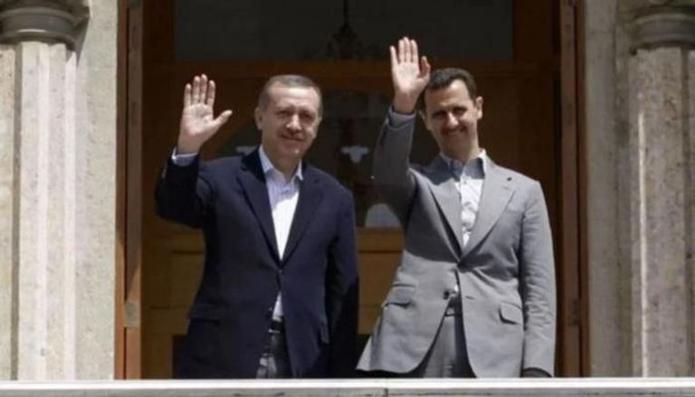 أردوغان مع بشار الأسد في لقاء سابق