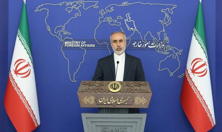 ناصر كنعاني المتحدث باسم الخارجية الإيرانية جندي إيراني يحرس سجن إيفين بطهران - أرشيفية