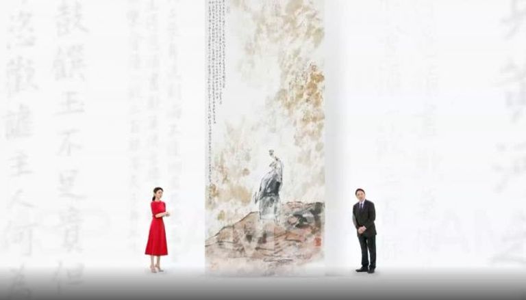 وانج مينج مينج بجانب إحدى لوحاته