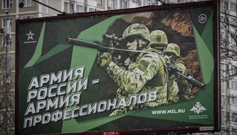 صور لجنود روس على الجدران في شوارع موسكو