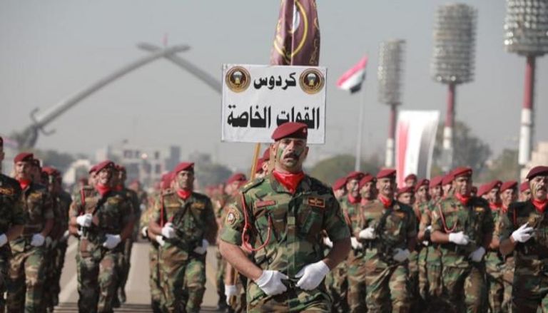 قوات من الجيش العراقي خلال استعراض عسكري عند ساحة الاحتفالات وسط بغداد