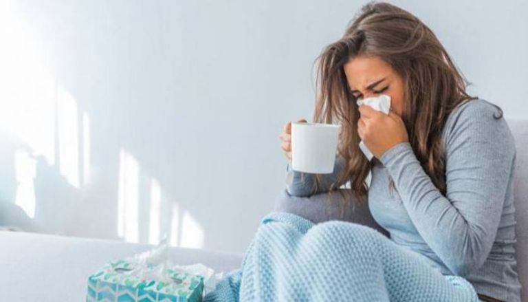 أعراض الإنفلونزا تتمثل في رجفة وتعرق وارتفاع الحرارة