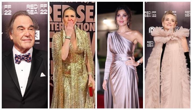 جاكي شان يتوسط مسؤولي المهرجان