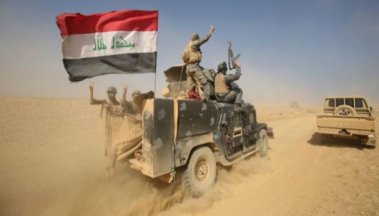 جنود عراقيون يلوحون بشارة النصر - أرشيفية