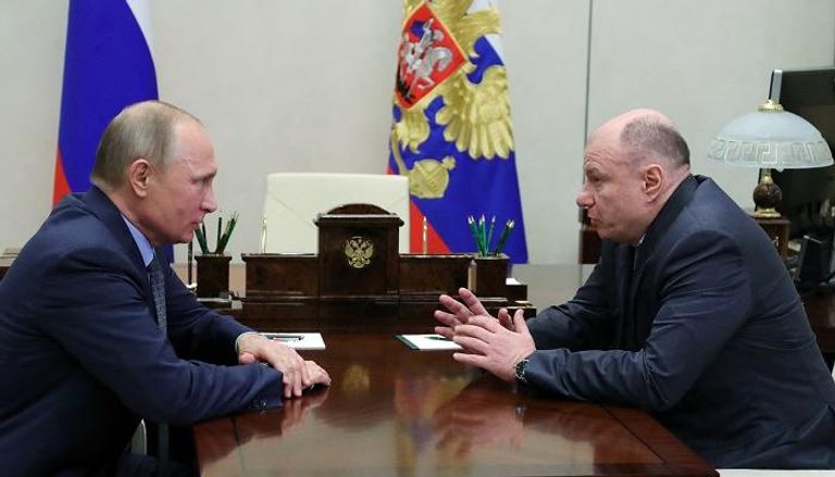الرئيس الروسي فلاديمير بوتين مع الملياردير الروسي فلاديمير بوتانين