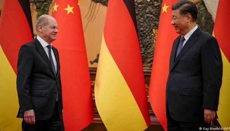 لقاء سابق بين الرئيس الصيني والمستشار الألماني