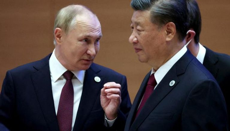 لقاء سابق بين الزعيمين الروسي والصيني