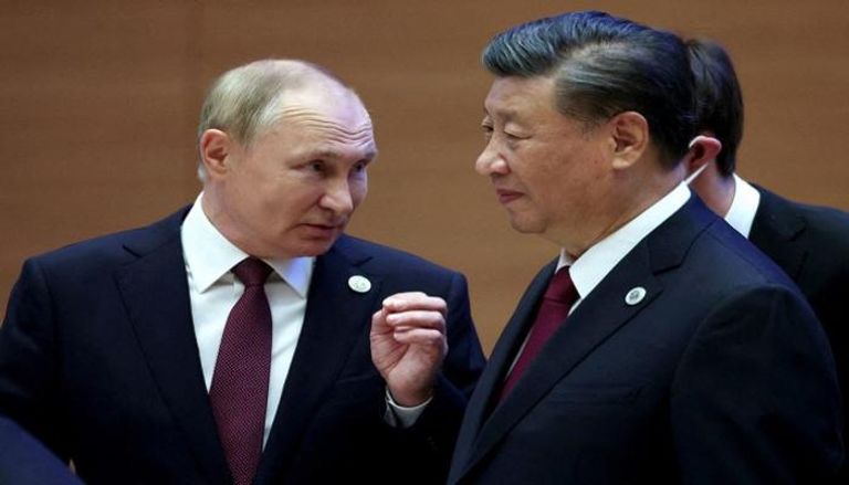 الرئيس الروسي بوتين يتحدث مع نظيره الصيني شي جين بينغ 