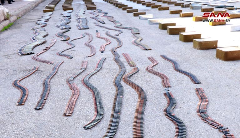 جانب من مخلفات داعش من الأسلحة والذخيرة في درعا السورية جانب من مخلفات داعش من الأسلحة والذخيرة في درعا السورية