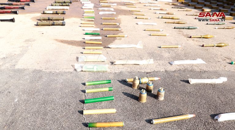 جانب من مخلفات داعش من الأسلحة والذخيرة في درعا السورية جانب من مخلفات داعش من الأسلحة والذخيرة في درعا السورية