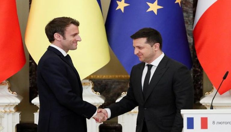 الرئيس الفرنسي خلال لقاء نظيره الأوكراني في كييف- رويترز