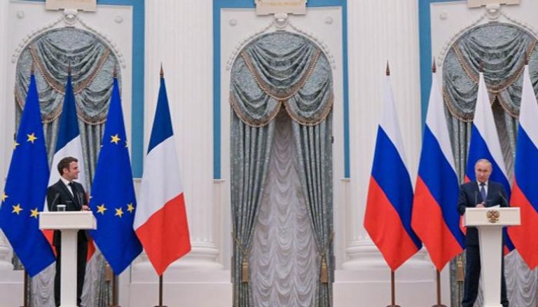 الرئيسان الروسي والفرنسي في مؤتمر صحفي سابق - أ.ف.ب