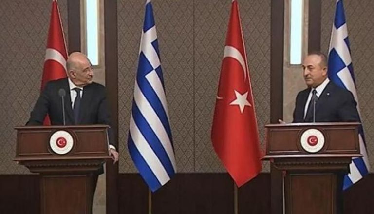 لقاء سابق بين وزيري خارجية تركيا واليونان