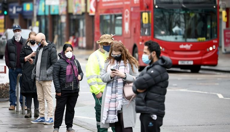 سيدة تخضع لاختبار كورونا في الصين- أرشيفية