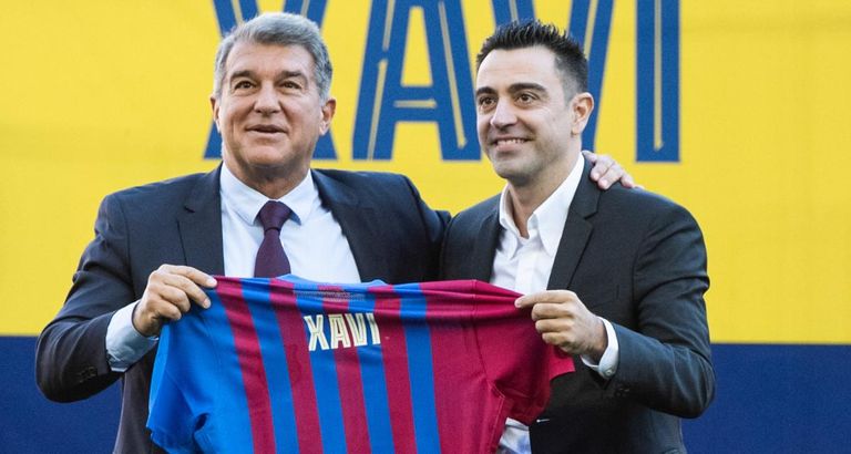 خوان لابورتا وتشافي هرنانديز إيرلينج هالاند مهاجم بروسيا دورتموند