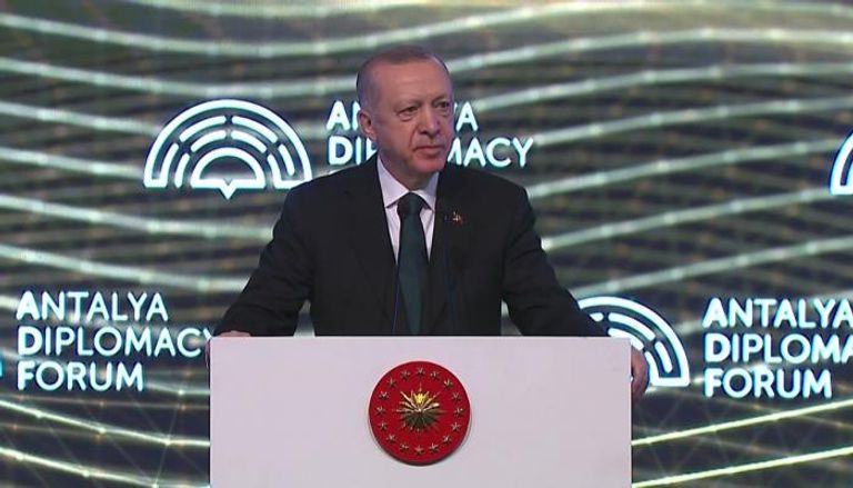 الرئيس التركي خلال كلمته بافتتاح منتدى أنطاليا الدبلوماسي