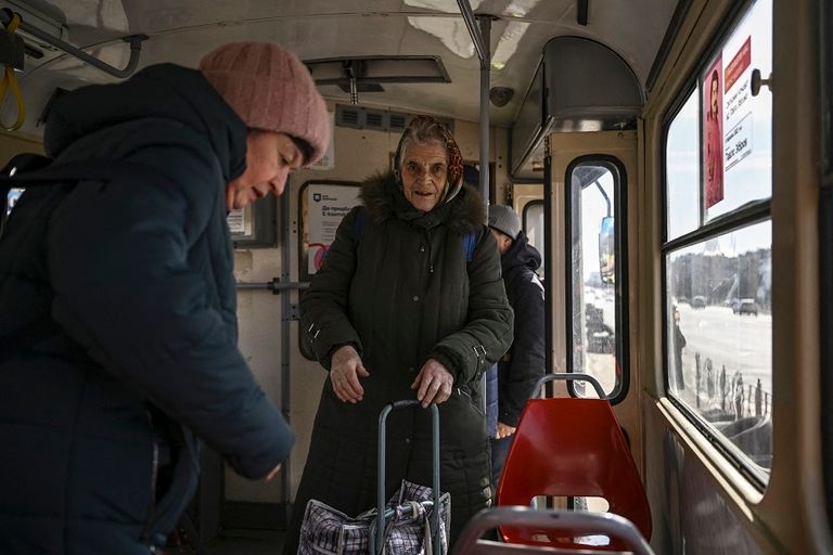 Passengers in line (8K) of the Kiev tram