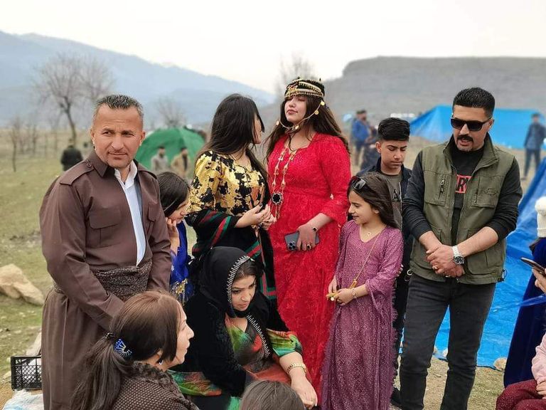 محتفلون عند متنزه وسط مدينة السليمانية بأعياد "نوروز"