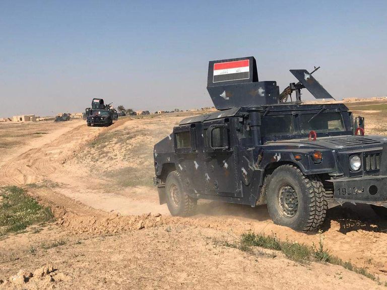 قوة من الشرطة الاتحادية عند وكر لداعش جنوب كركوك