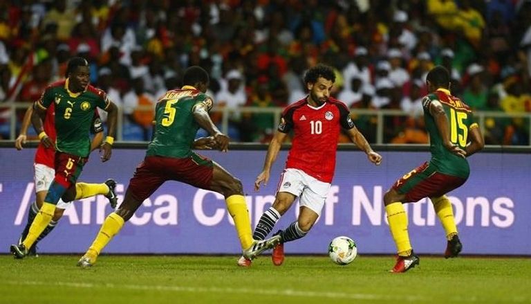 محمد صلاح مع ليونيل ميسي