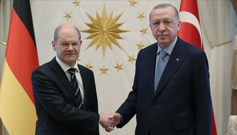 أردوغان والمستشار الألماني في لقاء سابق