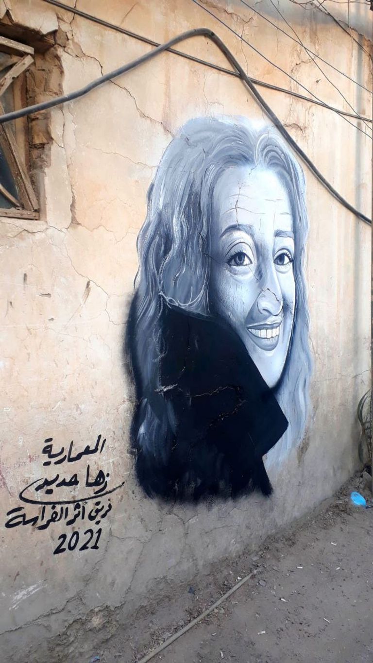 تزيين زقاق قديم بمنطقة الكاظمية برسومات فلكلورية