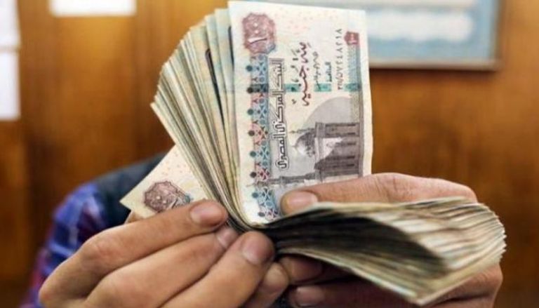 عملات نقدية فئة 100 جنيه مصري - رويترز