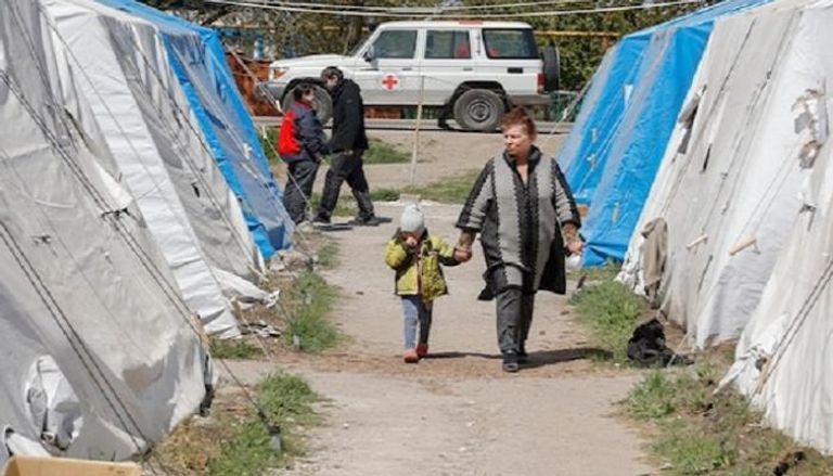 لاجئون أوكران في مخيم مؤقت
