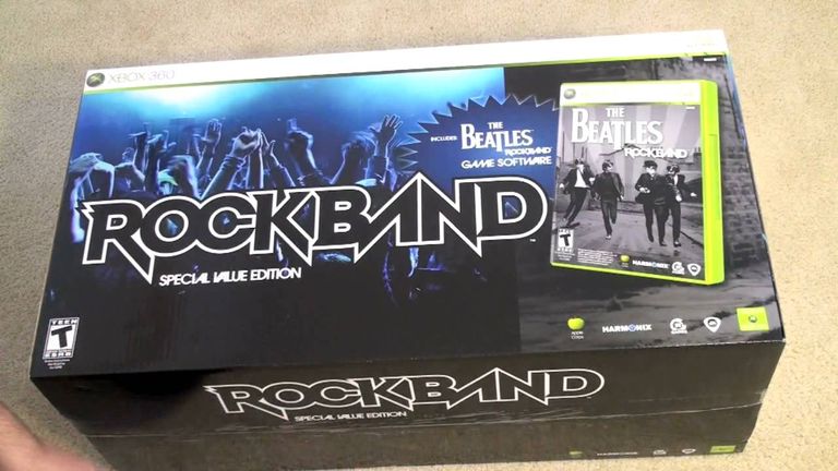 Beatles Rock Band Xbox 360 النسخة العاشرة بعد المليون من جهاز بلاي ستيشن 1