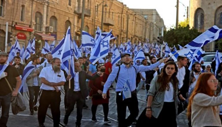 مسيرة سابقة بالأعلام الإسرائيلية