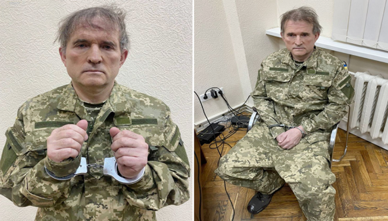 فيكتور ميدفيتشوك بعد القبض عليه فيكتور ميدفيتشوك مع فلاديمير بوتين وبعد القبض عليه