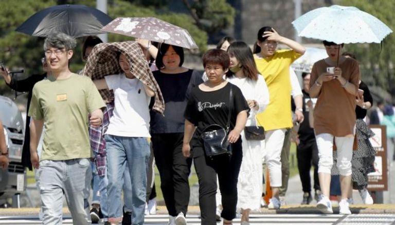 اليابان تعيش يومًا شديد الحرارة - أرشيفية