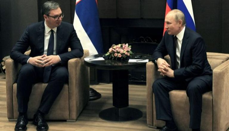 لقاء سابق بين بوتين وألكسندر فوتشيتش