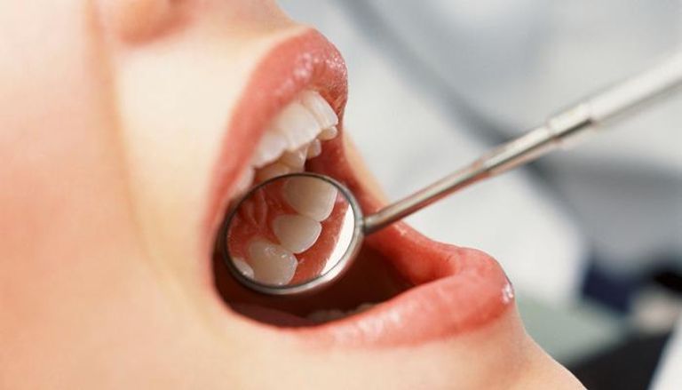 مشاكل الفم يمكن أن تكون علامة على أمراض الجسم