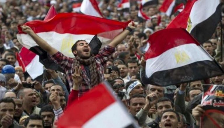 شباب مصريون خلال ثورة 30 يونيو - أرشيفية