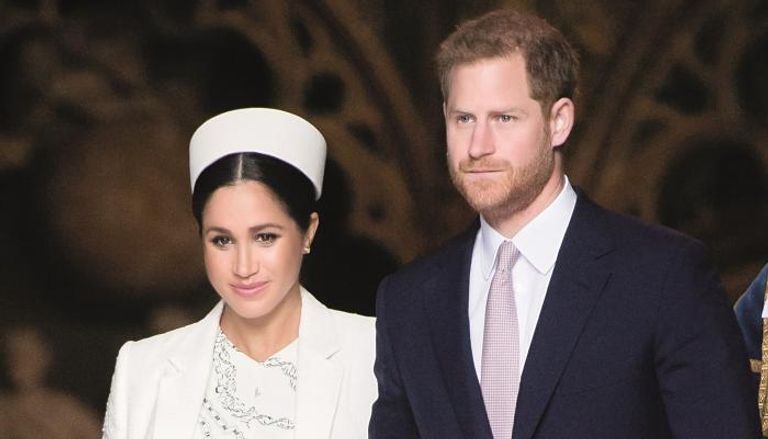 الملكة إليزابيث والأمير هاري وميجان ماركل