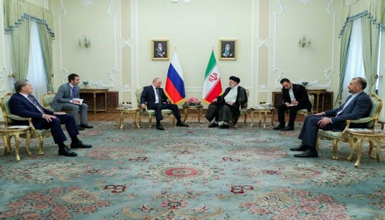 جانب من لقاء رئيسي روسيا فلاديمير بوتين وإيرن إبراهيم رئيسي - رويترز