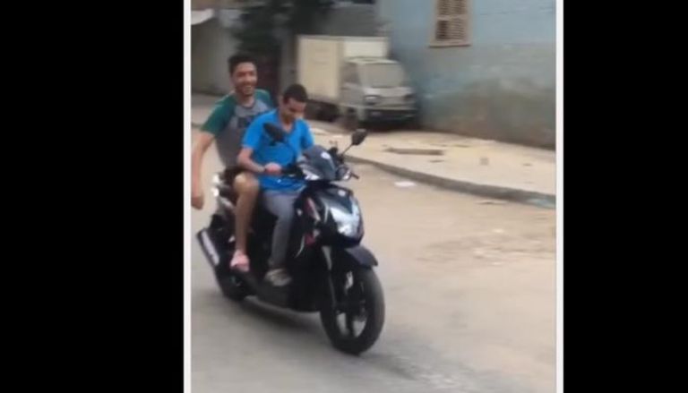 مازن ومحمد على الدراجة النارية