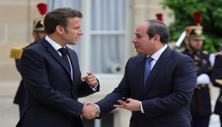 الرئيس المصري خلال لقاء نظيره الفرنسي في باريس- رويترز