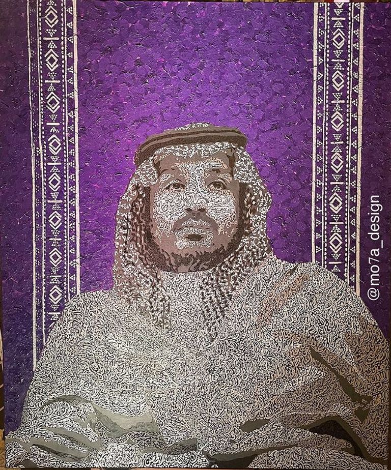 التشكيلي السعودي محمد باجبير مع لوحاته