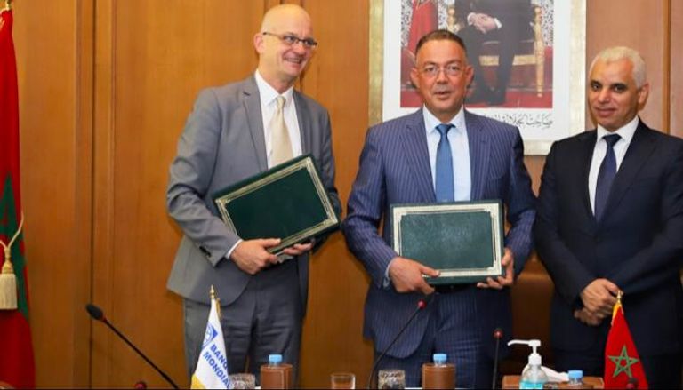 جانب من توقيع الاتفاقية بين المغرب والبنك الدولي