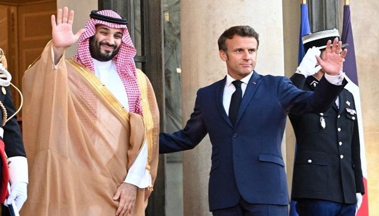 الرئيس الفرنسي خلال استقبال ولي العهد السعودي