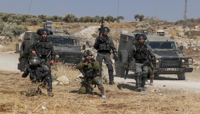 جنود إسرائيليون خلال مواجهات مع فلسطينيين بالضفة (أرشيفية)
