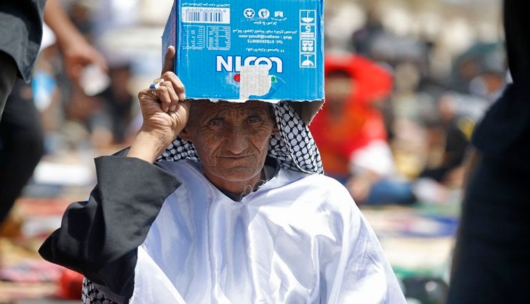 جانب من إعداد الوجبات في اعتصامي بغداد