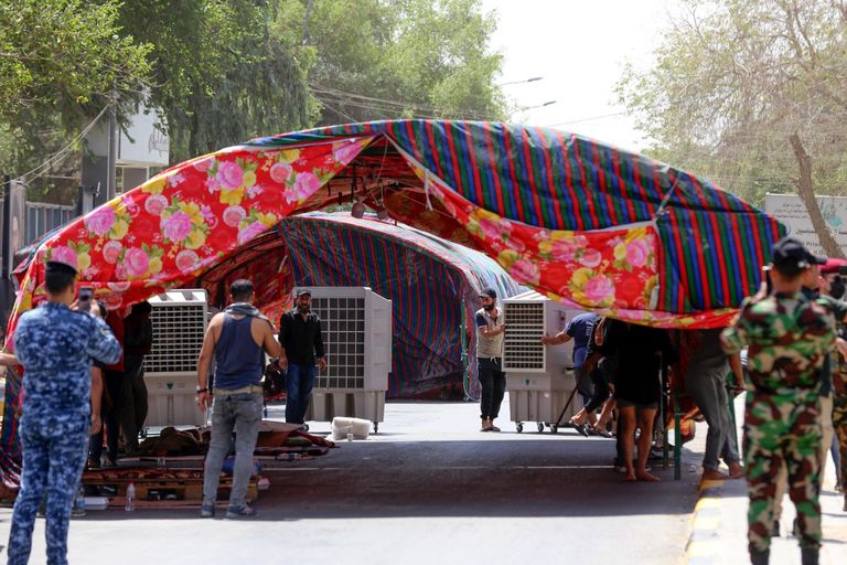 جانب من إعداد الوجبات في اعتصامي بغداد